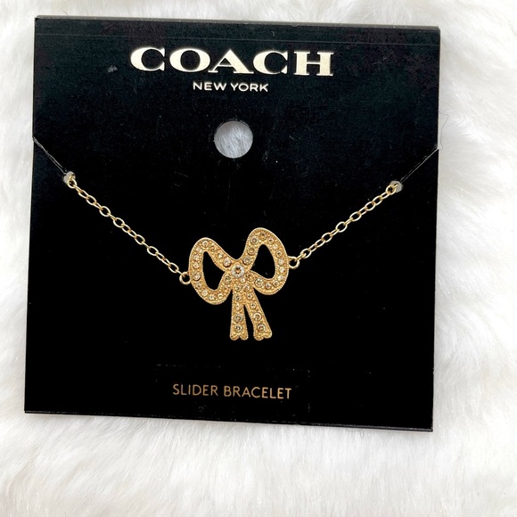 Coach Jewelry - Coach Pave Gold Crystal Bow Slider Bracelet
